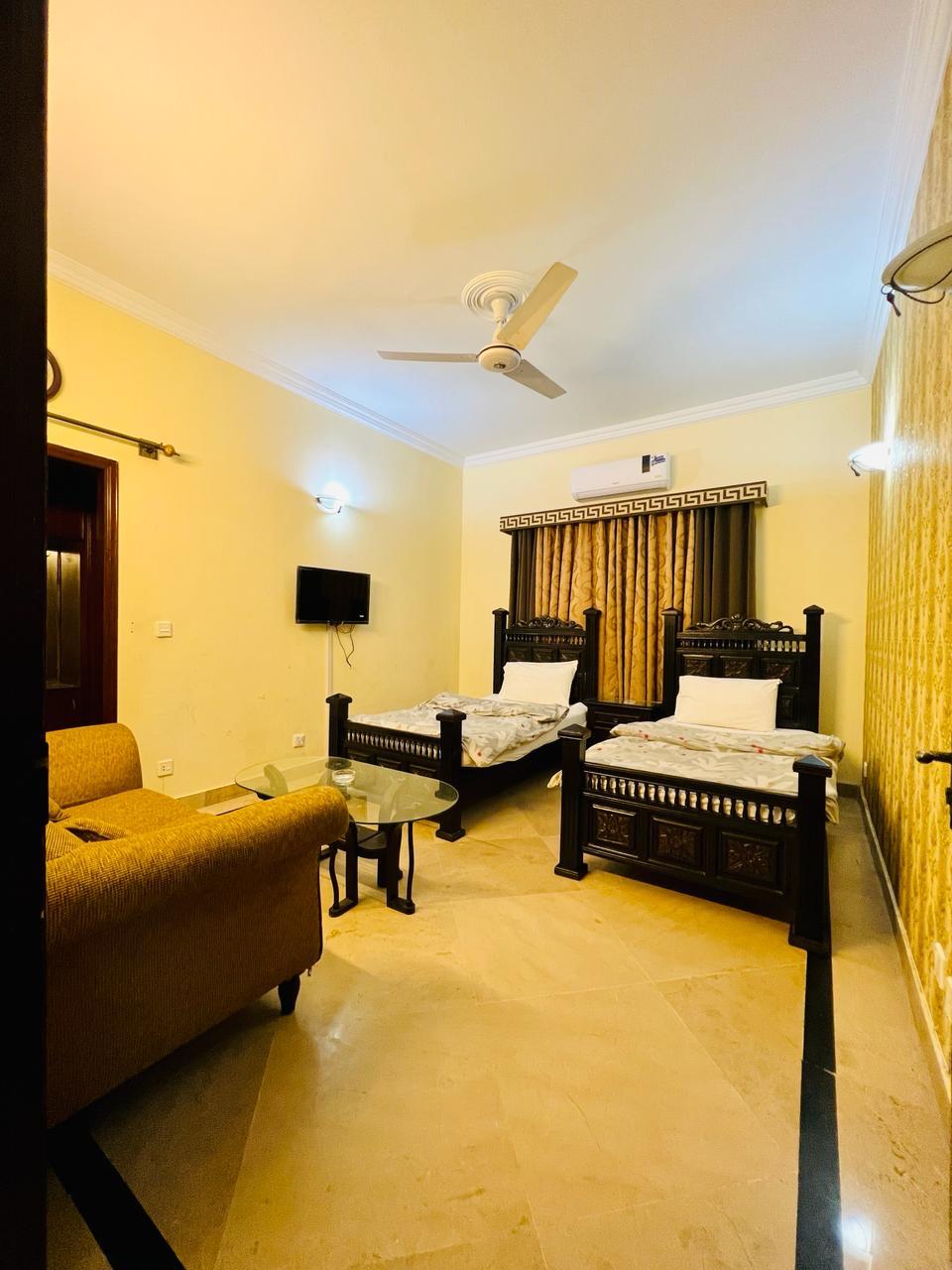Twin share room step inn guest house Islamabad family guest house